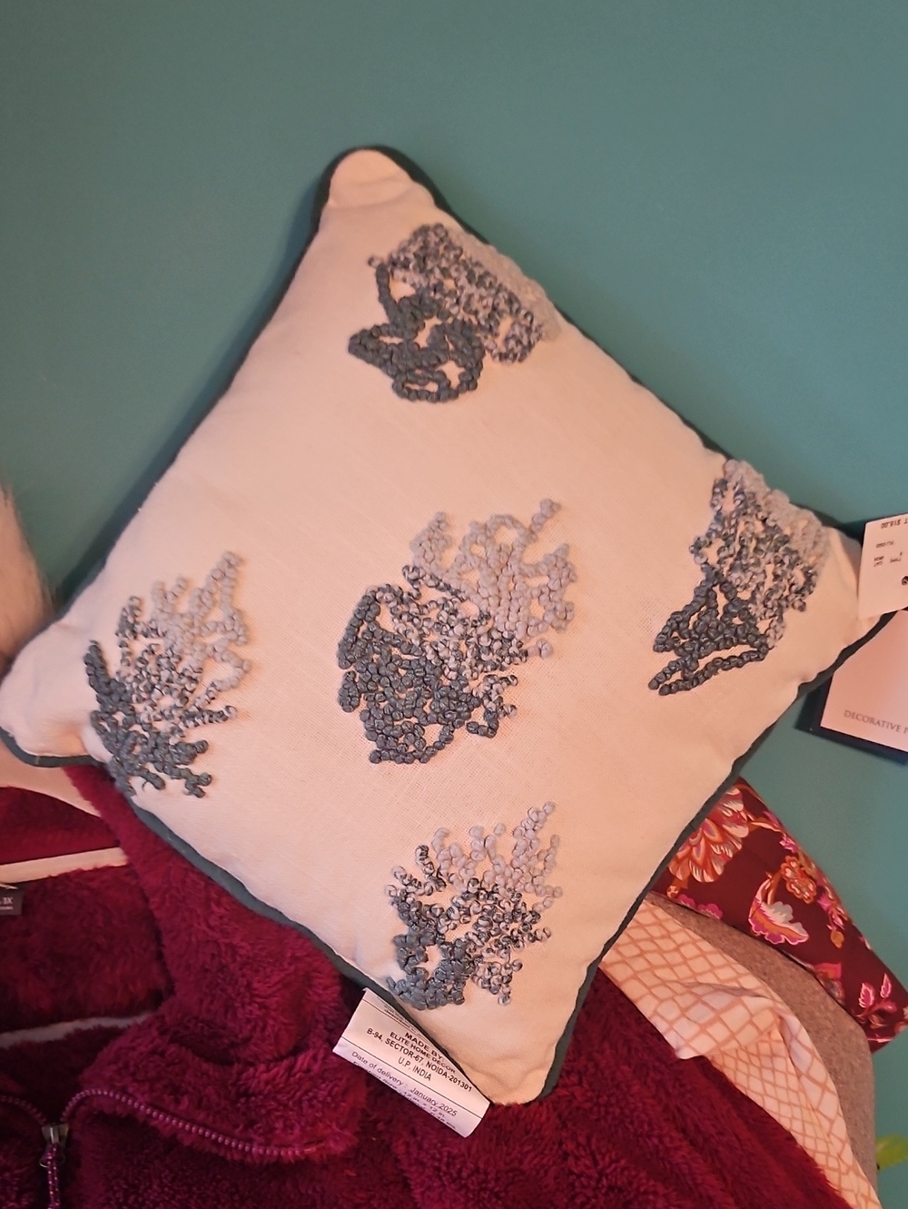 Decorative White Pillow with Blue Embroidered Coral Design